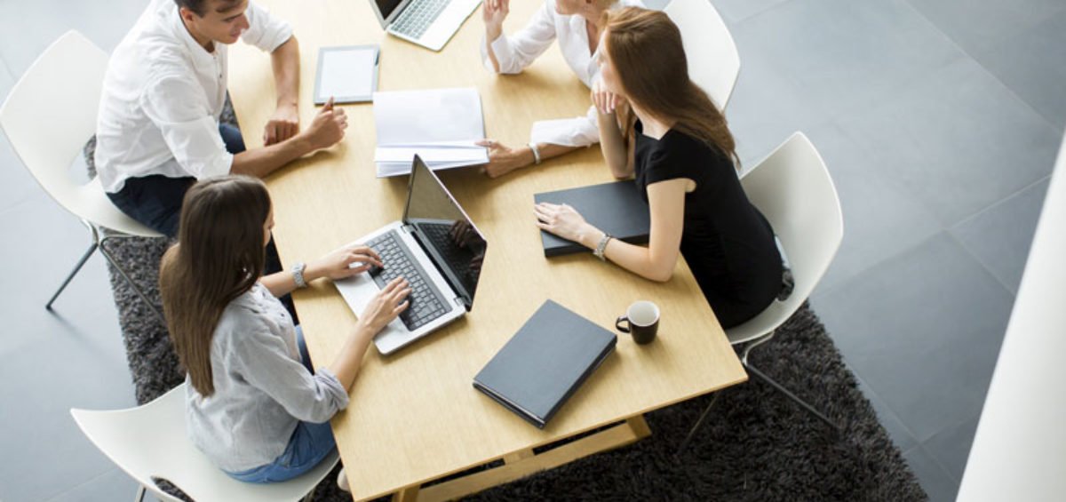 people working around a table